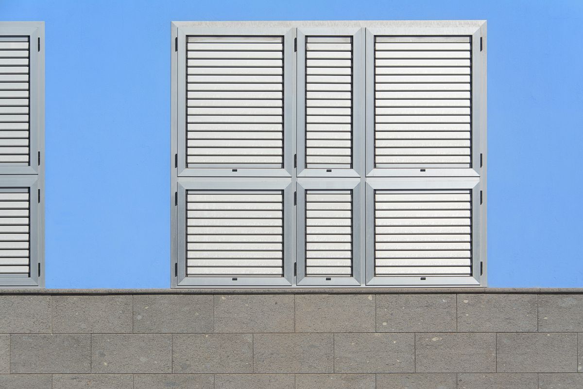 Aluminium louvre blade profiles on a building facade
